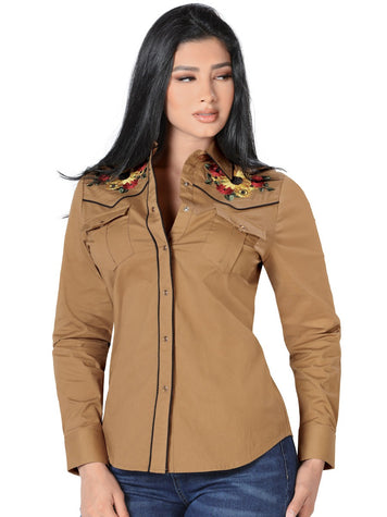 Blusas vaqueras de moda 2025